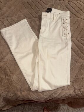 White House Black Market Cream Lace-Up Boot Cut Jeans